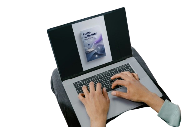 Person using a laptop with a screen displaying 'Luma Collection' on a white background